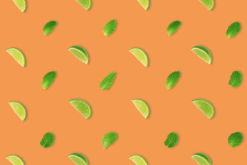 LIMES AND MINTS LEAVES PATTERN ON PASTAL BACKGROUND.