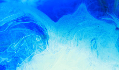 Fototapeta na wymiar Abstract Art. Marble texture. Paint splash. Colorful fluid. Abstract colored background.Blue color floating on water.