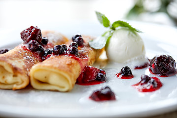 pancakes with berries and ice cream