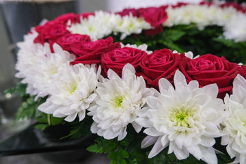 Roses and chrysanthemum  flowers arrangement, white and red roses, small cute flowers.