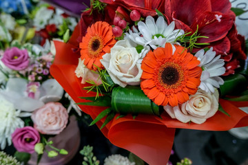 Beautiful bouquet of mixed flowers. Floral shop, flower market. Selective focus.