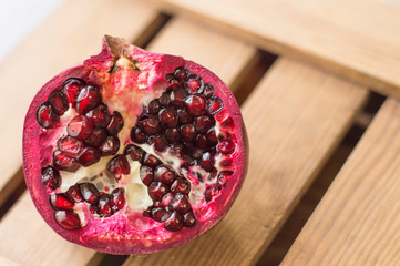 red ripe pomegranate in close-up section