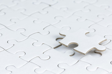 Close up of jigsaw puzzle.Fulfill and  fix the problem of incomplete.Business solutions for success...