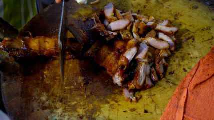 Roast pork fish balls in a hot pan, sauce eaten sweet and sold in the general market   
