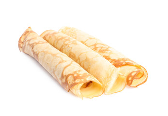 Rolled fresh thin pancakes isolated on white