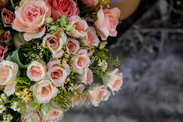 Artificial flower composition in floral shop. Floral theme, making bouquets.