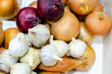 Fresh onions and .garlic. Onions and .garlic in the market.