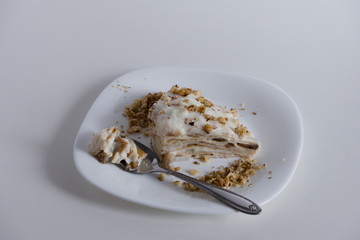 Composition a piece of cake with nut sprinkles