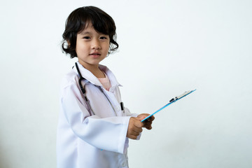 Photo of kid doctor with stethoscope on white background
