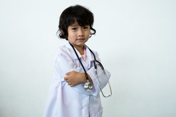 Photo of kid doctor with stethoscope on white background