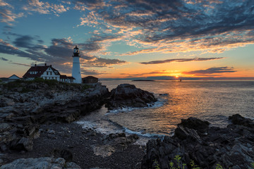 Sunrise at Portland Head Lighthouse in Cape Elizabeth, New England, Maine, USA.	