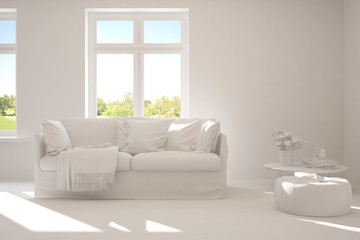 Mock up of minimalist living room in white color with sofa and green landscape in window. Scandinavian interior design. 3D illustration