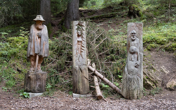 The wooden sculptures of persons of Dolomites Alps legends