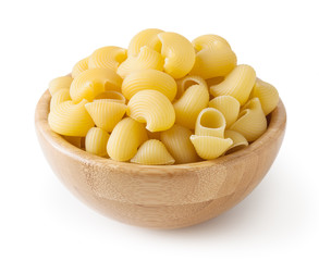 Uncooked pipe rigate pasta in wooden bowl isolated on white background with clipping path