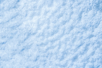 blue texture of an snow surface with pure white wave , blue cold clear cryslallized wall background ,decorative plaster background close up , abstract macro wallpaper