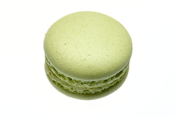 green round baked almond flour macaron isolated on a white background, delicious popular french 