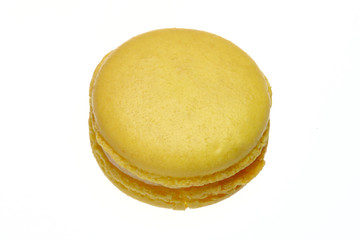 Yellow lemon cake macaroon isolated on a white background  baked almond flour macaron isolated on a white background, delicious popular french dessert