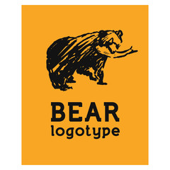 Logo bear with fish in the mouth