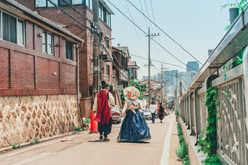 local travel with traditional house and clothing in korea from backside of travel in hanbok dress...