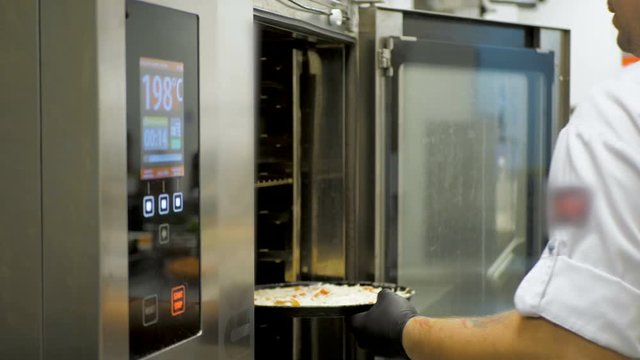 Italian pizza is cooked in the Combi oven. The process of cooking