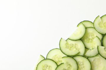 Fresh cucumber slices on white background, top view
