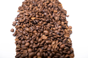 Amount of coffee beans forming like a river