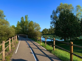 MORESTEL, FRANCE - AUGUST 26, 2019: Beautiful bicycle lane nearby Rhone river, between Lyon and Geneva.