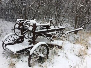 Fototapeta na wymiar Snow on Old Equipment