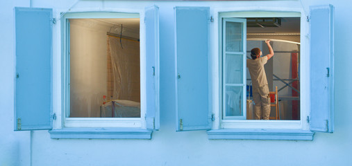 Obraz premium worker behind the window 