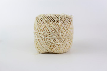 Cream yarn isolated on white background
