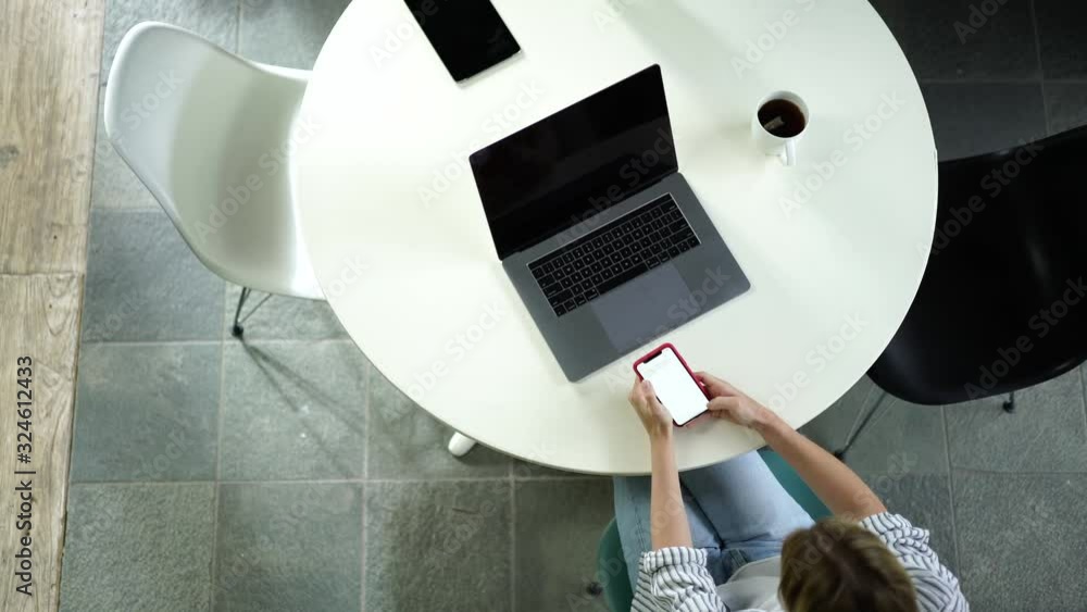 Poster top view of young millennial hipster girl using modern technologies for networking while sitting at 