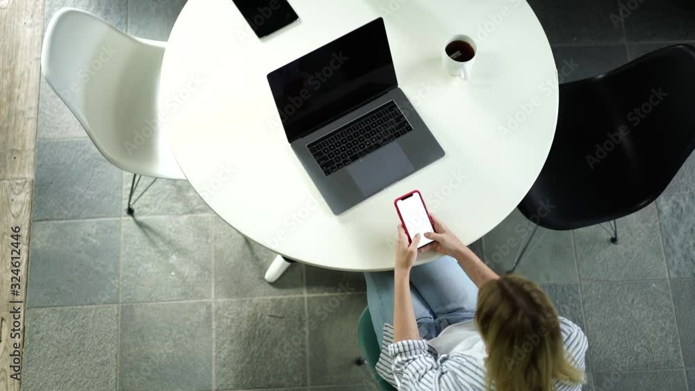 Aufkleber top view of young female blogger using modern devices and wifi cor share content and multimedia in s