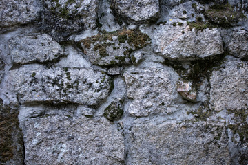 old stone wall with moss