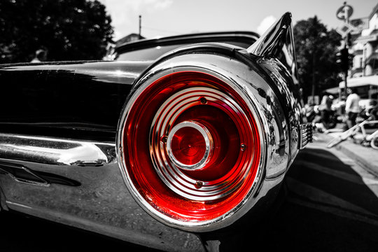 BERLIN - JUNE 05, 2016: Stoplight of a personal luxury car Ford Thunderbird (third generation). Close-up. Combined toning. Black-and-white-red. Classic Days Berlin 2016.