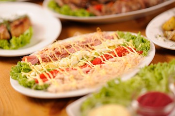 table full of different food. Restaurant party