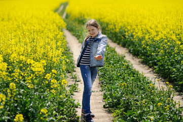 Young girl on a on country road