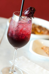  Closeup Iced roselle juice with dried roselle flower for healthy.. Selective focus and blurred background.