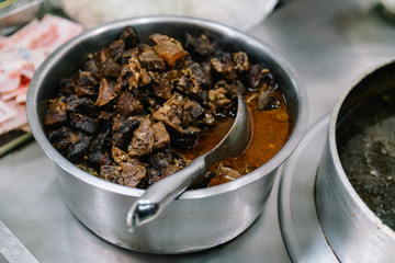 Steamed beef stew for making beef noodle, famous street food in Jiufen, Taiwan.