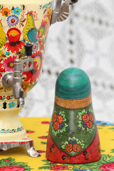 Russian traditional wooden nesting toy - matryoshka, nested doll in form of woman in national...