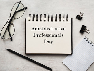 Secretaries Day and Admin Day. Greeting card. Close-up, view from above, wooden surface. Concept of...