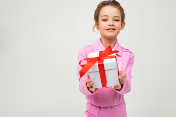 joyful happy caucasian girl received a birthday present on a white background with copy space