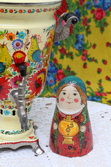 Russian traditional wooden nesting toy - matryoshka, nested doll in form of woman in national...