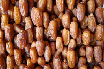 Close up of fresh date fruit display for sale 
