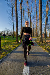 Young woman running in the park