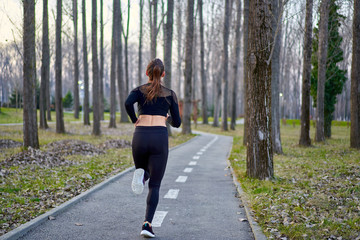 Young woman running in the park