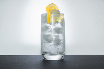 glass of tonic water with lemon 