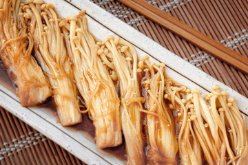Pan Fried Enoki Mushroom with Teriyaki Sauce.