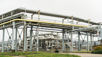 Industrial oil product storage tanks and pipelines at the oil product terminal