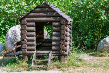 Small log cabin.