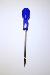an awl with a blue pen on a white background